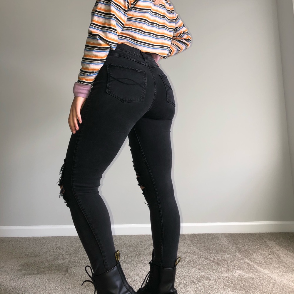 Faded black vintage ripped skinny jeans